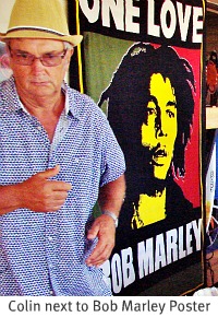 Bob Marley Poster Chef Colin next to Bob Marley Poster