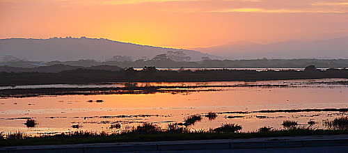 Sunset over Swartvlei Lagoon. Sunset over Swartvlei Lagoon.