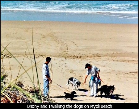 Martin and Briony walking their dogs on Myoli Beach Martin and Briony walking their dogs on Myoli Beach