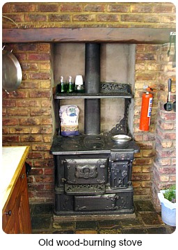 Wood burning stove in the kitche Wood burning stove in the kitche