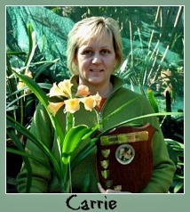 Carrie holding one of her awards Carrie holding one of her awards