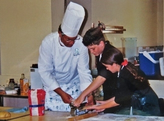 Colin cooking with school children of all ages.