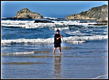 Fisherman on Swartvlei Beach