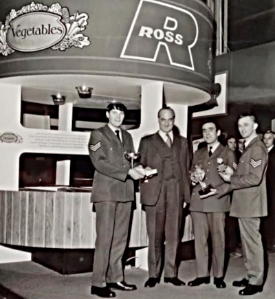 The CEO of Ross Frozen Foods with 3 of the team winners of the Trophy.