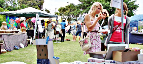 People enjoying the abundant stalls of the outdoor Leisure Isle Spring Festival