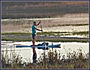 Peaceful evening on the lagoon stand-up paddle