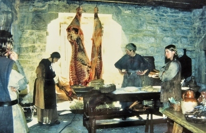 Kitchen scene of a Beef Carcass on a spit above an open Fire for "Ivanhoe".
