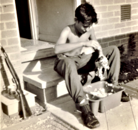 Colin plucking a pigeon