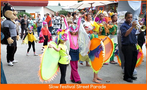 Dramatic butterfly creations in the Sunday morning Slow Town Festival street parade. Dramatic butterfly creations in the Sunday morning Slow Town Festival street parade.