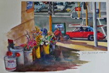 Flowers for sale in buckets on a street corner