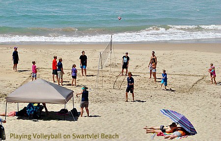 playing volleyball on Swartvlei beac playing volleyball on Swartvlei beach
